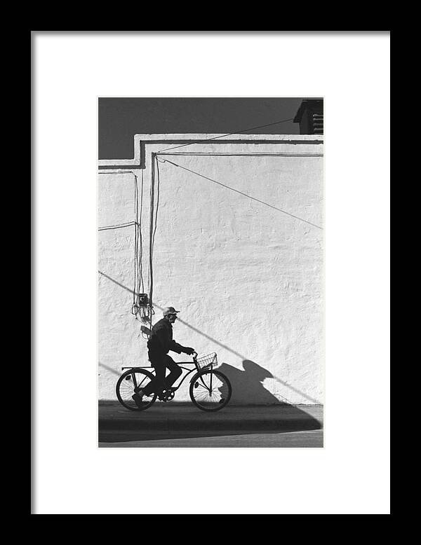 Bicycle; Man; Old; Older; Senior; Poor; Poverty; Transportation; Bike; Bikes; Retirement; Shadow; Shadows; Time; Travel; Balance; Bygone Framed Print featuring the photograph Shadow Man by Gerard Fritz