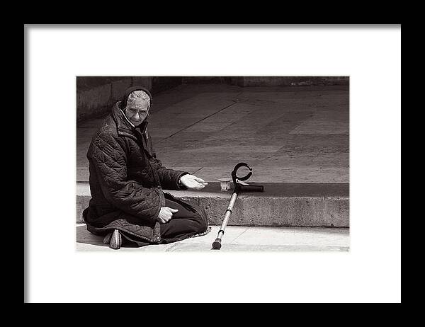 Lisbon Framed Print featuring the photograph She Begs at the Cathedral by Lorraine Devon Wilke