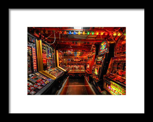  Yhun Suarez Framed Print featuring the photograph Slot Machines by Yhun Suarez