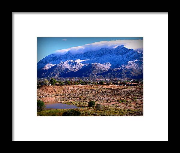 Sandia Crest Framed Print featuring the photograph Snow Covered Mountains Above the Pond by Aaron Burrows