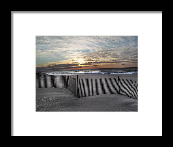 Snow Fence Framed Print featuring the photograph Snow Fence at Coopers Beach by Steve Gravano
