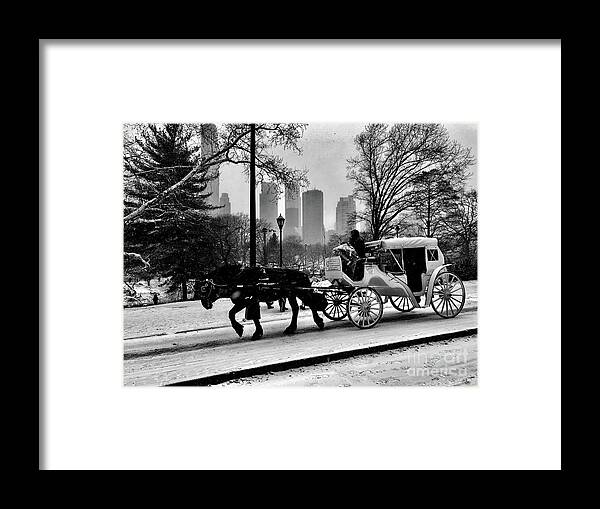 Horse And Buggy Framed Print featuring the photograph Snowy Ride by Dennis Richardson