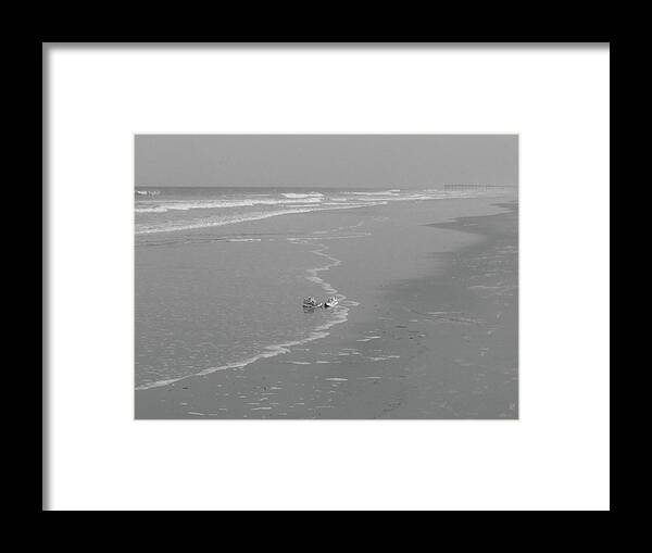 Sneakers Framed Print featuring the photograph Solo Sea Shore Sneakers by WaLdEmAr BoRrErO