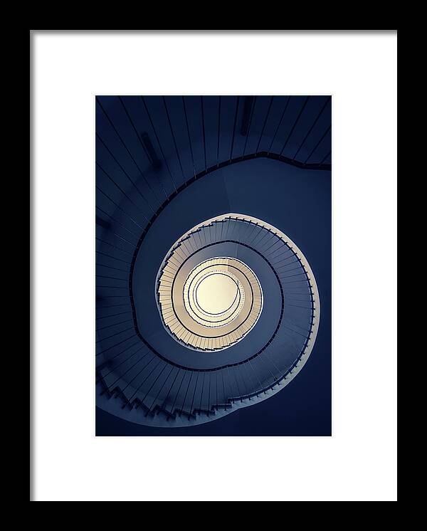 Spiral Staircase Framed Print featuring the photograph Spiral staircase in blue and cream tones by Jaroslaw Blaminsky
