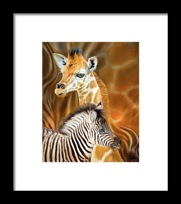 Carol Cavalaris Framed Print featuring the mixed media Spots And Stripes - Giraffe And Zebra by Carol Cavalaris