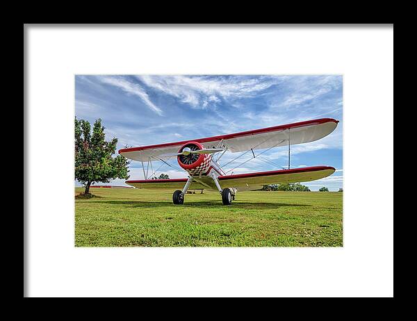 Aviation Framed Print featuring the photograph Stearman on Grass by Chris Buff