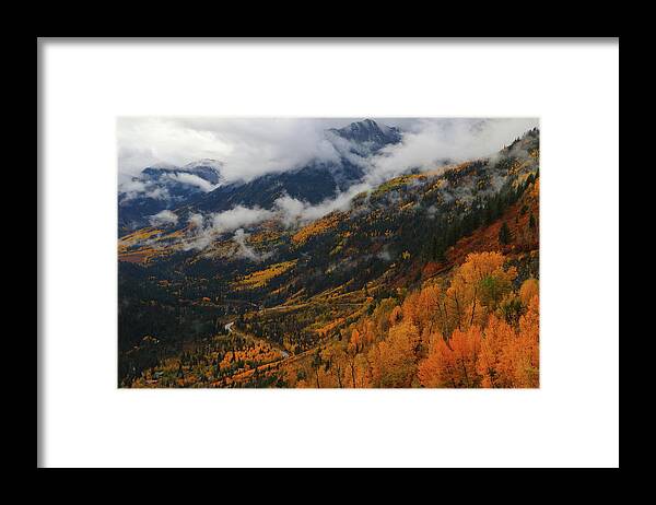 Mcclure Framed Print featuring the photograph Storm clouds over McClure pass during autumn by Jetson Nguyen