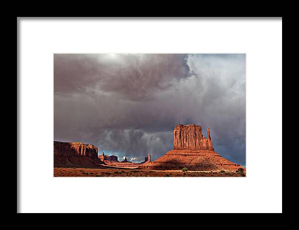 Desert Framed Print featuring the photograph Storm over Monument Valley by Wesley Aston