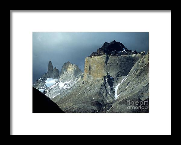 Torres Del Paine Framed Print featuring the photograph Stormy Light Over Los Cuernos del Paine by James Brunker