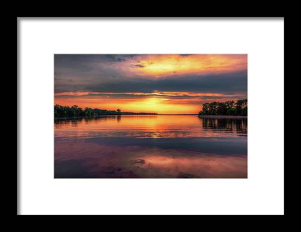 Sunset Framed Print featuring the photograph Stormy Reflections by Susan Rissi Tregoning