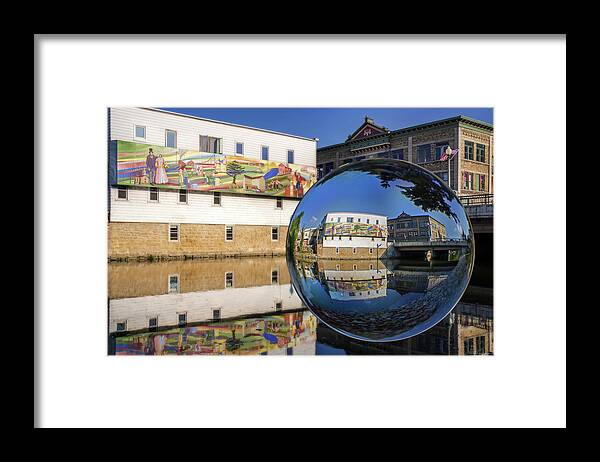 Stoughton Wi Wisconson Mural Yahara River Glass Sphere Water Horizontal Buildings Framed Print featuring the photograph Stoughton Downtown Mural on Yahara River by Peter Herman