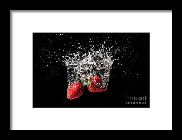 Strawberry Framed Print featuring the photograph Strawberry fruit big splash into water by Simon Bratt