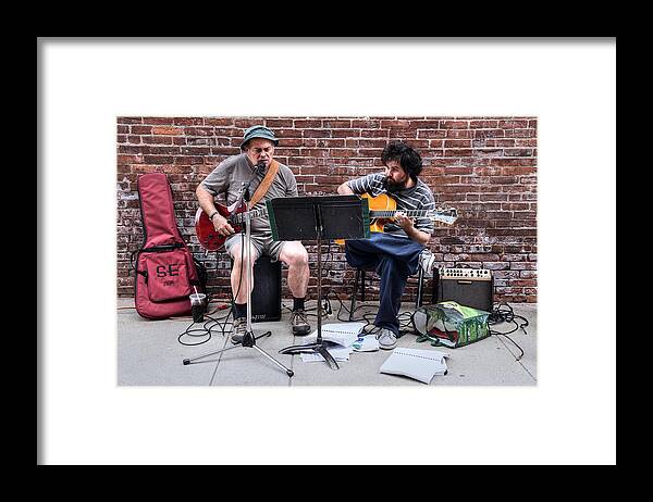 Musicians Framed Print featuring the photograph Street Musicians by Geoffrey Coelho