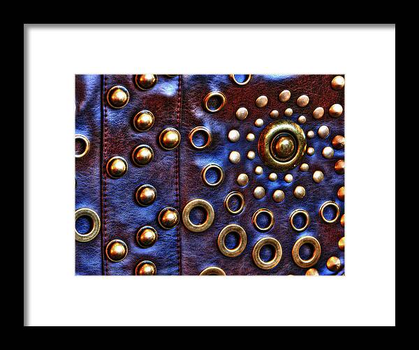Hand-held Framed Print featuring the photograph Studs on Leather by Chris Anderson