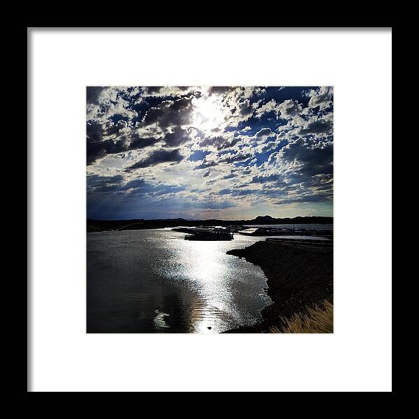 Sun Framed Print featuring the photograph Sun Through the Dark Clouds Over the Bay by Vic Ritchey