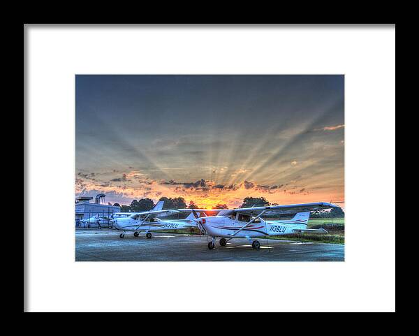 Cessna 172 Framed Print featuring the photograph Sunburst Over the Ramp by Phil And Karen Rispin