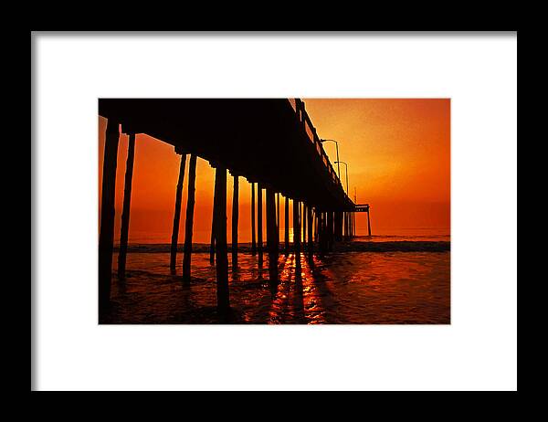 Sunrise Framed Print featuring the photograph Sunrise at the pier. Ocean City MD by Bill Jonscher
