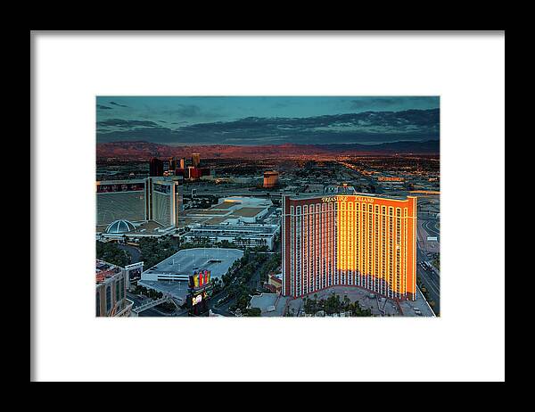 Aerial Framed Print featuring the photograph Sunrise on the Sierra Nevada Mountains and the Hotels on the Las Vegas Strip by Ami Parikh