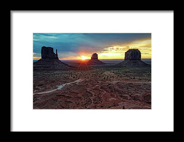 Monument Valley Framed Print featuring the photograph Sunset at Monument Valley Navajo Tribal Park Three Mittens Arizona by Silvio Ligutti
