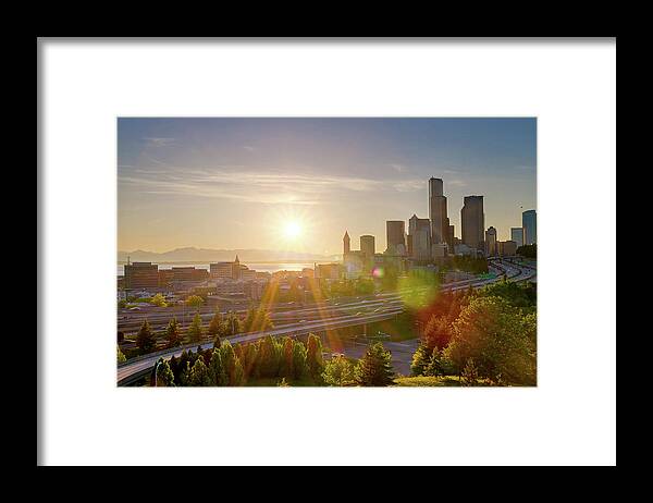 Seattle Framed Print featuring the photograph Sunset over Seattle Downtown Skyline by David Gn