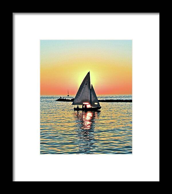 Sailing Framed Print featuring the photograph Sunsets Glow by Frozen in Time Fine Art Photography