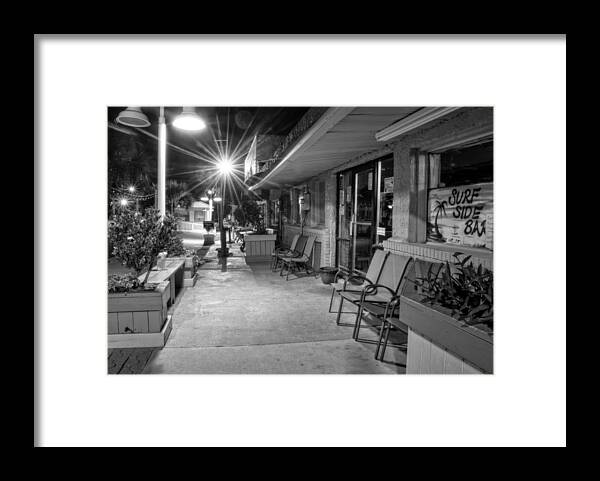 Surf Side Bar Framed Print featuring the photograph Surf Side Bar At Night in Black and White by Greg and Chrystal Mimbs