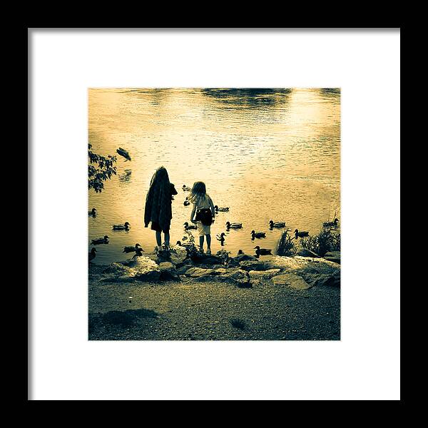 Kids Framed Print featuring the photograph Talking to ducks by Bob Orsillo