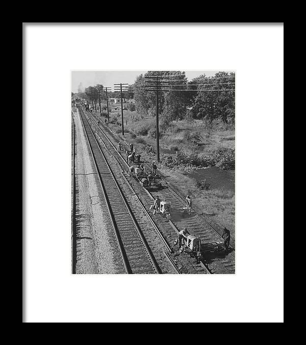 Train Tracks Framed Print featuring the photograph Team of Laborers Work on Track by Chicago and North Western Historical Society