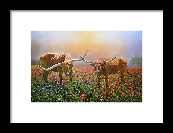 Texas Longhorns Framed Print featuring the photograph Texas Longhorns in Spring Wildflowers by Lynn Bauer