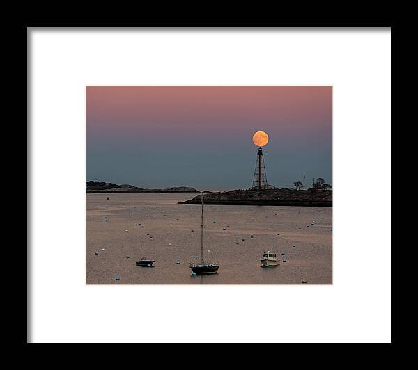 Marblehead Framed Print featuring the photograph The 2016 Supermoon balancing on the Marblehead Light Tower in Marblehead MA by Toby McGuire