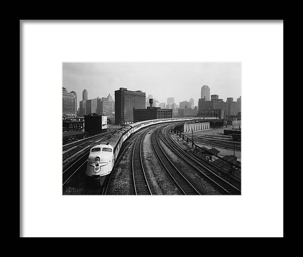 Chicago Framed Print featuring the photograph 400 Passenger Train Leaves Chicago Terminal - 1963 by Chicago and North Western Historical Society