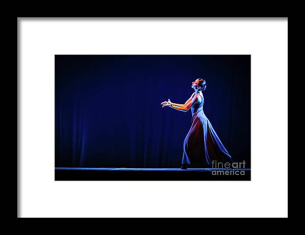 Ballet Framed Print featuring the photograph The beautiful ballerina dancing in blue long dress by Dimitar Hristov
