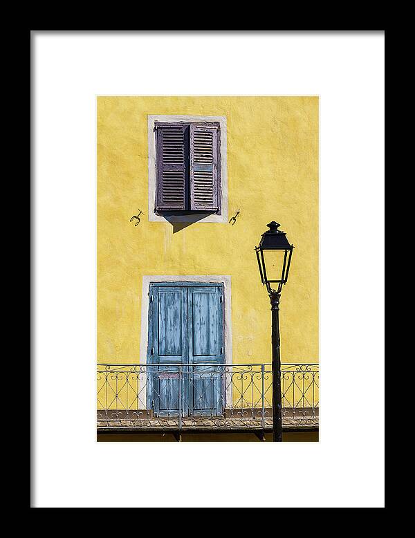Door Framed Print featuring the photograph The blue door by Paul MAURICE