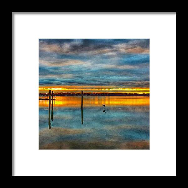 Reflection Framed Print featuring the photograph Serene Sunset by Lauren Fitzpatrick