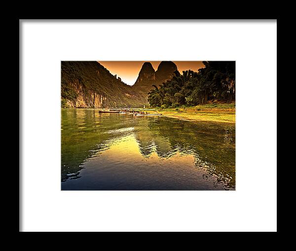 Sunset Framed Print featuring the photograph The coming complete peace-China Guilin scenery Lijiang River in Yangshuo by Artto Pan