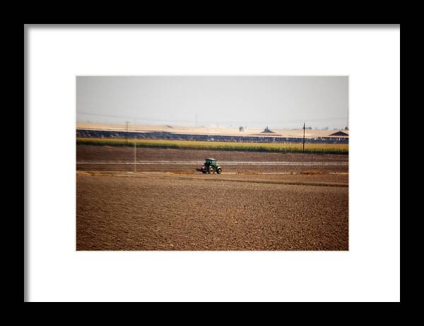 Tractor Framed Print featuring the photograph The green Tractor by Maria Aduke Alabi