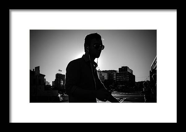 Backlight Framed Print featuring the photograph The guy - Oslo, Norway - Black and white street photography by Giuseppe Milo
