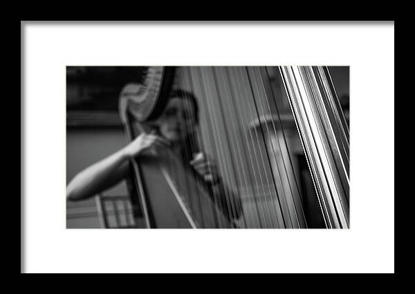 Artist Framed Print featuring the photograph The harpist - Dublin, Ireland - Black and white photography by Giuseppe Milo