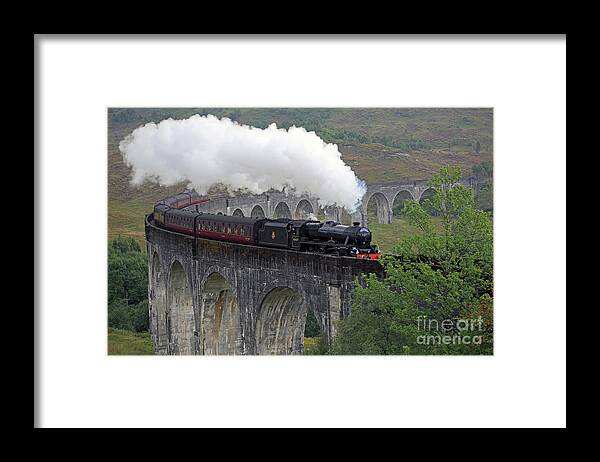 Jacobite Framed Print featuring the photograph The Jacobite Steam Train by Maria Gaellman