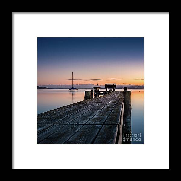 Ammersee Framed Print featuring the photograph The jetty to sunset by Hannes Cmarits