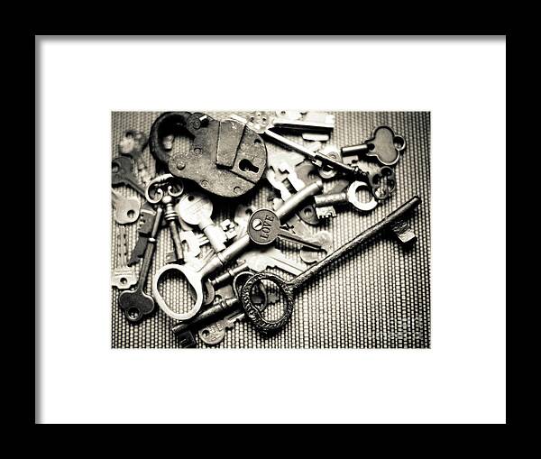 Keys Framed Print featuring the photograph The Key to Love by Ana V Ramirez