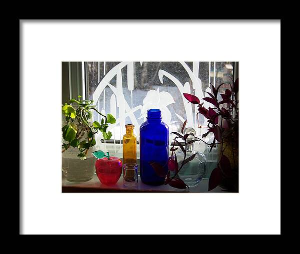 Colored Bottles Framed Print featuring the photograph The Kitchen Window Sill by Jackie Mueller-Jones