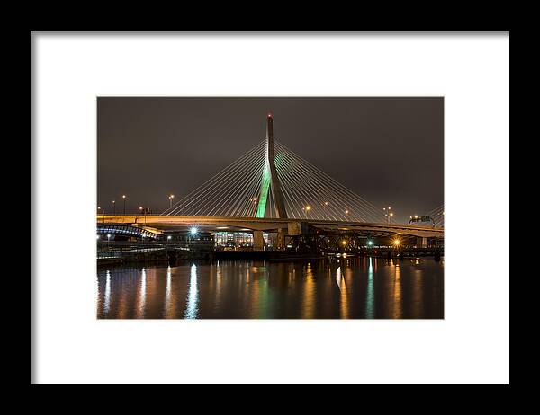 Boston Framed Print featuring the photograph The Leonard P Zakim bridge lit up in green for St Patrick's Day Reflection by Toby McGuire