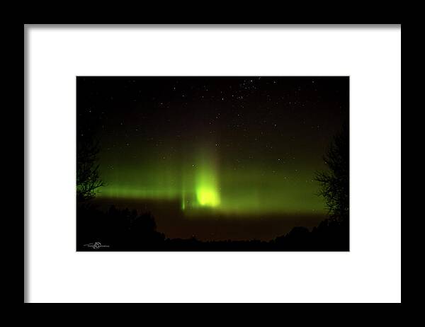 Aurora Borealis Framed Print featuring the photograph The Northern Lights Peaks Aurora Borealis by Torbjorn Swenelius