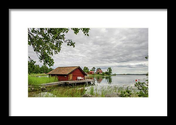 The Old Boat-house Framed Print featuring the photograph The old boat-house by Torbjorn Swenelius