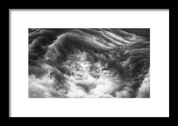 Storm Clouds Framed Print featuring the photograph The push back by Charles McCleanon