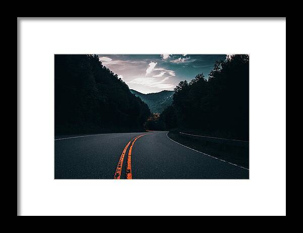 Road Framed Print featuring the photograph The Road by Unsplash