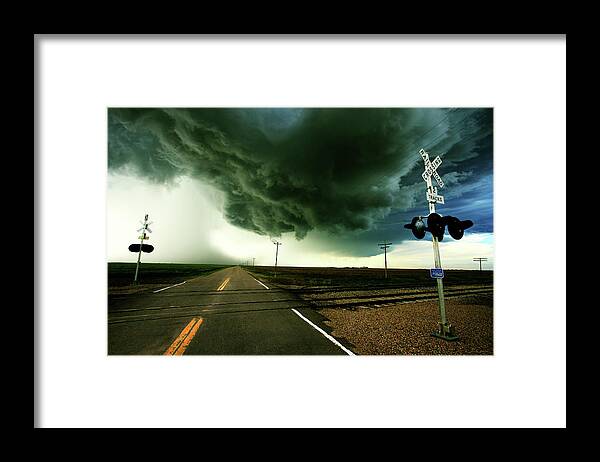 Weather Framed Print featuring the photograph The Rough Road Ahead by Brian Gustafson