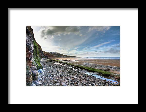 Seaside Framed Print featuring the photograph The Seaside town of Saltburn by Jeff Townsend