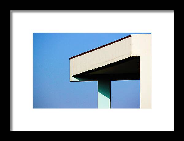 Clear Blue Sky Framed Print featuring the photograph The Slight Tilt by Prakash Ghai